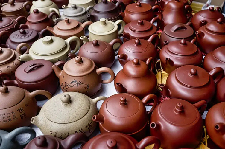 A vast array of clay and Yixing pots in display