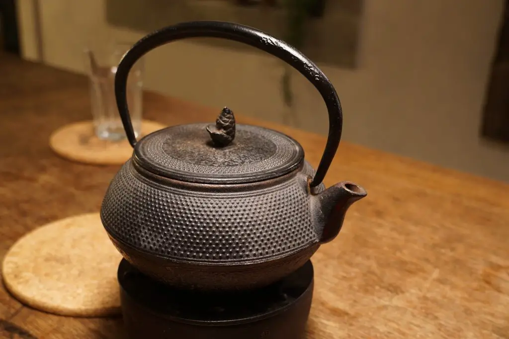 Cast iron teapot placed on a table