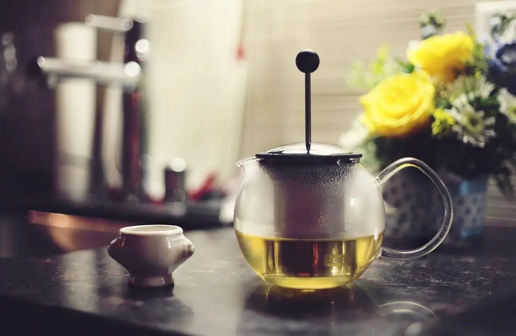 Brewing herbal tea in a kettle