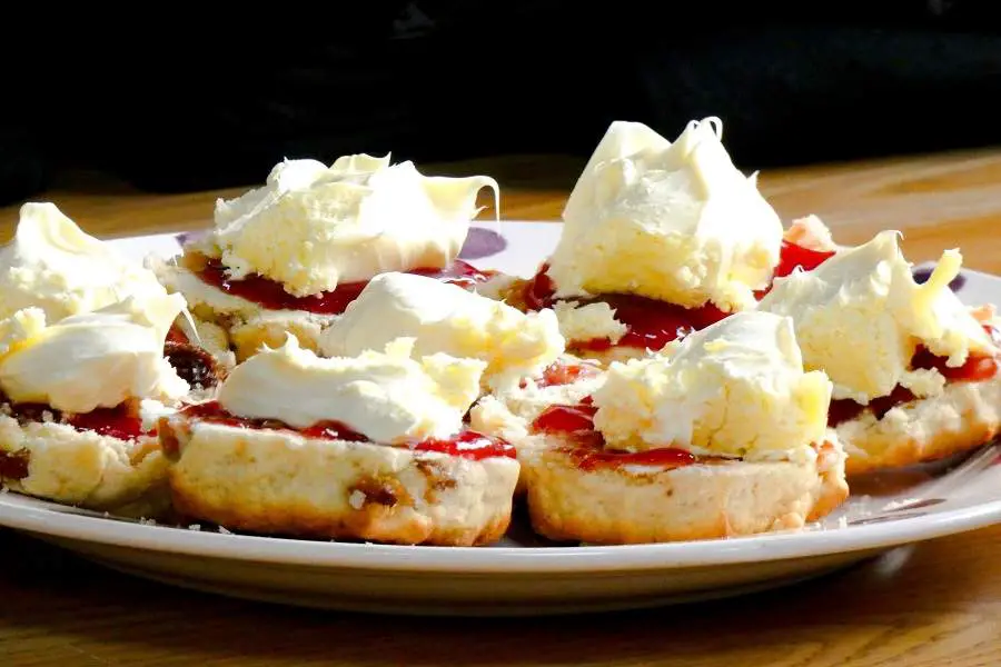 Jam and clotted cream bread on a plate
